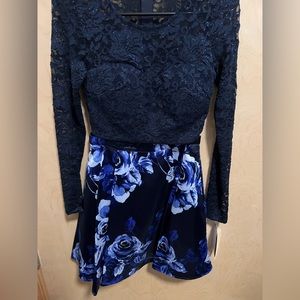 Beautiful two piece floral skirt/glitter top set. Never worn! Has tags. :)